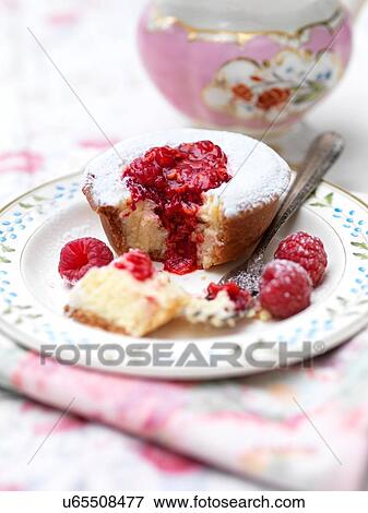 Stock Photo - Raspberry tart on plate. Fotosearch
