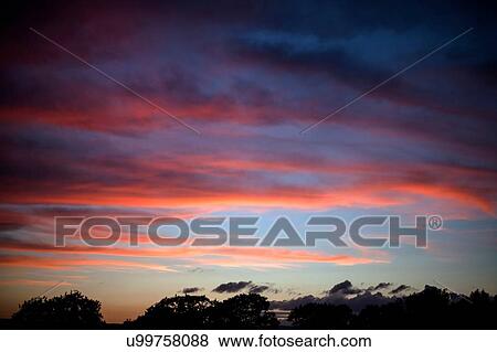 Red sky sunset View Large Photo Image Stock Photo - Red sky sunset. Fotosearch