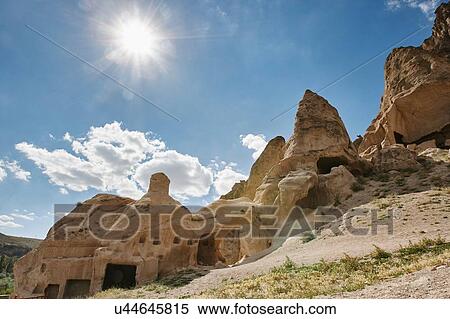 Stock Photography - Rock formation dwellings on hillside, Cappadocia, Anatolia, Turkey. Fotosearch