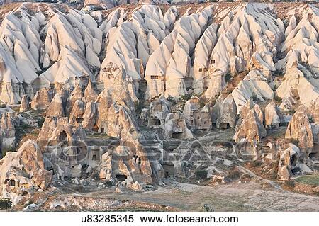 Stock Photography - Rock formations dwellings, Cappadocia, Anatolia, Turkey. Fotosearch