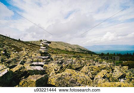 Rocks stack in rugged landscape, Ural Mountains, Russia View Large Photo Image Picture - Rocks stack in rugged landscape, Ural Mountains, Russia. Fotosearch