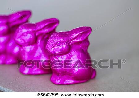 Row of three pink easter bunnies View Large Photo Image Stock Photography - Row of three pink easter bunnies. Fotosearch
