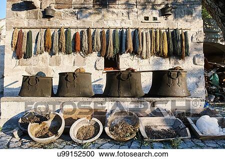Stock Image - Rows of old traditional textiles and bowls, Cappadocia, Anatolia, Turkey. Fotosearch