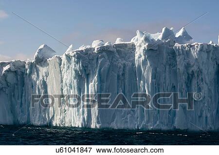 Rugged iceberg, Ilulissat icefjord, Disko Bay, Greenland View Large Photo Image Stock Photo - Rugged iceberg, Ilulissat icefjord, Disko Bay, Greenland. Fotosearch