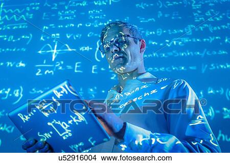 Scientist with digital tablet and projected mathematical data View Large Photo Image Picture - Scientist with digital tablet and projected mathematical data. Fotosearch