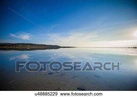 Stock Photo - Seascape and blue skies, Villasimius, Sardinia, Italy. Fotosearch