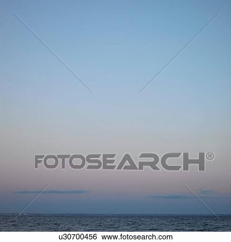 Stock Photograph - Seascape at sunset. Fotosearch