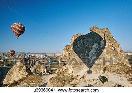 Shadow of hot air balloons on rock formation, Cappadocia, Anatolia, Turkey View Large Photo Image Stock Photo - Shadow of hot air balloons on rock formation, Cappadocia, Anatolia, Turkey. Fotosearch