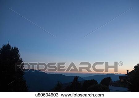 Silhouetted landscape at sunset, Brixen, Dolomites, Austria View Large Photo Image Stock Image - Silhouetted landscape at sunset, Brixen, Dolomites, Austria. Fotosearch