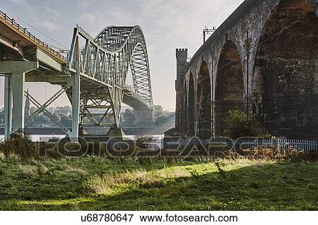 Stock Photo - Silver Jubilee Bridge and Runcorn Railway Bridge, Runcorn, Cheshire, England. Fotosearch
