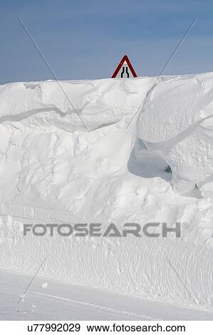 Stack of snow in front of road sign at Ilulissat, Greenland View Large Photo Image Stock Photo - Stack of snow in front of road sign at Ilulissat, Greenland. Fotosearch