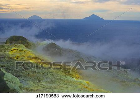 Sulphur and fumarole smoke at Gran Cratere and view of islands, Vulcano Island, Aeolian Islands, Sicily, Italy View Large Photo Image Stock Image - Sulphur and fumarole smoke at Gran Cratere and view of islands, Vulcano Island, Aeolian Islands, Sicily, Italy. Fotosearch