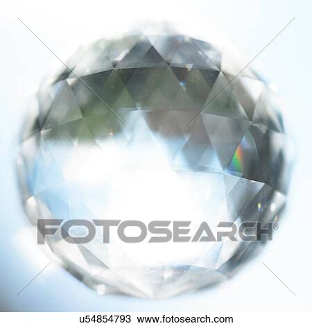 Stock Image - Sunlit faceted crystal. Fotosearch