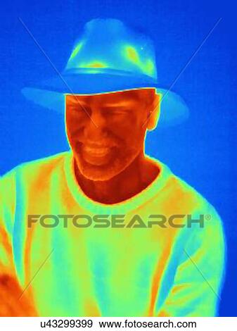 Thermal image of young man wearing face mask panama hat View Large Photo Image Stock Photo - Thermal image of young man wearing face mask panama hat. Fotosearch