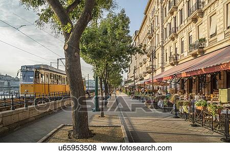 Tram and restaurant along the Danube, Hungary, Budapest View Large Photo Image Stock Photo - Tram and restaurant along the Danube, Hungary, Budapest. Fotosearch