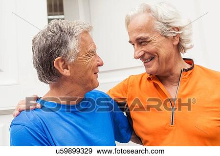 Two happy senior male runners at front door View Large Photo Image Stock Photo - Two happy senior male runners at front door. Fotosearch