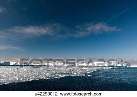 View of sea ice and icebergs, Ilulissat icefjord, Disko Bay, Greenland View Large Photo Image Stock Image - View of sea ice and icebergs, Ilulissat icefjord, Disko Bay, Greenland. Fotosearch