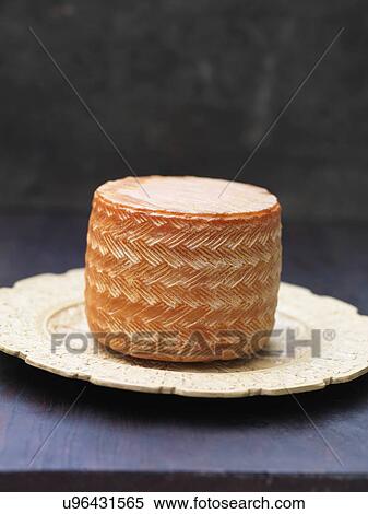 Whole manchego cheese on plate View Large Photo Image Stock Photography - Whole manchego cheese on plate. Fotosearch