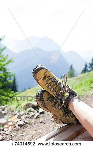 Young girl relaxing in rural environment, focus on feet View Large Photo Image Stock Image - Young girl relaxing in rural environment, focus on feet. Fotosearch