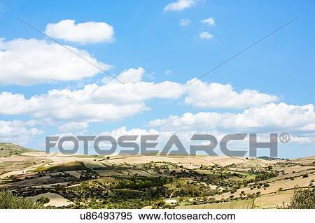 Blue sky and field landscape, Siracusa, Sicily, Italy View Large Photo Image Stock Photography - Blue sky and field landscape, Siracusa, Sicily, Italy. Fotosearch