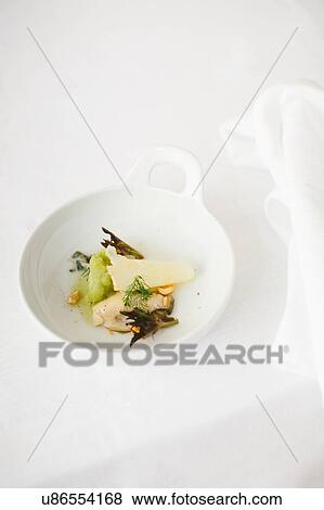 Bowl of oyster with sorbet and salad View Large Photo Image Stock Photo - Bowl of oyster with sorbet and salad. Fotosearch