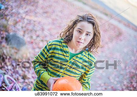 Boy playing ball in garden View Large Photo Image Stock Image - Boy playing ball in garden. Fotosearch