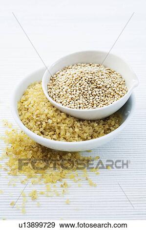 Stock Photo - Bulgur wheat and Quinoa seeds. Fotosearch