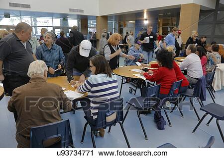 Caucus goers and voters wait in line to enter a caucus location in Las Vegas, Nevada, U. S., on Tuesday, Feb. 23, 2025 View Large Photo Image Stock Image - Caucus goers and voters wait in line to enter a caucus location in Las Vegas, Nevada, U. S., on Tuesday, Feb. 23, 2025. Fotosearch