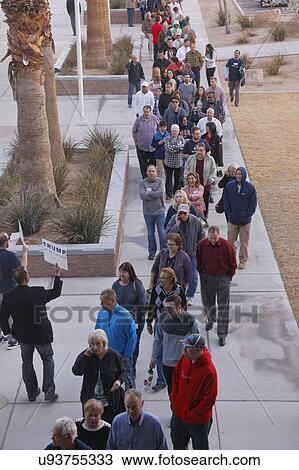 Caucus goers and voters wait in line to enter a caucus location in Las Vegas, Nevada, U. S., on Tuesday, Feb. 23, 2019 View Large Photo Image Stock Image - Caucus goers and voters wait in line to enter a caucus location in Las Vegas, Nevada, U. S., on Tuesday, Feb. 23, 2019. Fotosearch