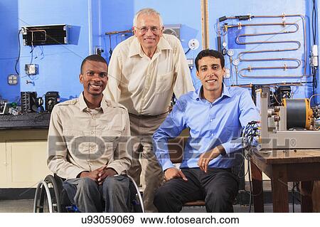 Stock Photo - Classroom with student in wheelchair. Fotosearch