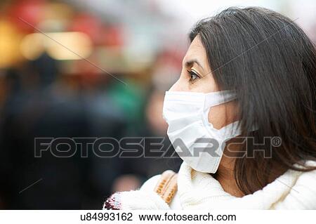 Close up of mature woman wearing pollution mask, Tokyo, Japan View Large Photo Image Stock Image - Close up of mature woman wearing pollution mask, Tokyo, Japan. Fotosearch
