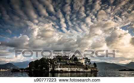 Stock Image - Clouds above Lake Maggiore, Piedmont, Lombardy, Italy. Fotosearch