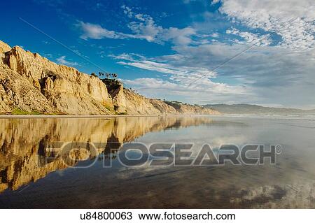 "Clouds reflecting in ocean along coastline, San Diego, California, USA" View Large Photo Image Stock Image - "Clouds reflecting in ocean along coastline, San Diego, California, USA". Fotosearch