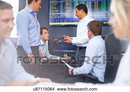 Colleagues in office having discussion View Large Photo Image Picture - Colleagues in office having discussion. Fotosearch