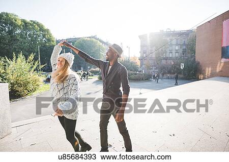 Couple dancing in park View Large Photo Image Stock Image - Couple dancing in park. Fotosearch