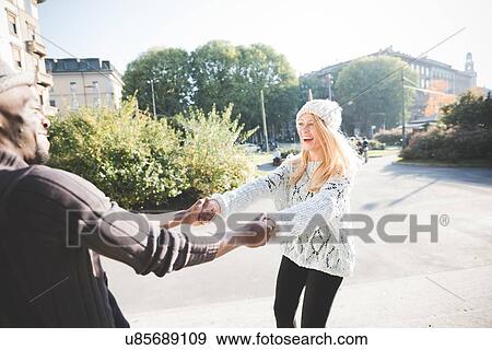 Couple dancing in park View Large Photo Image Stock Photo - Couple dancing in park. Fotosearch