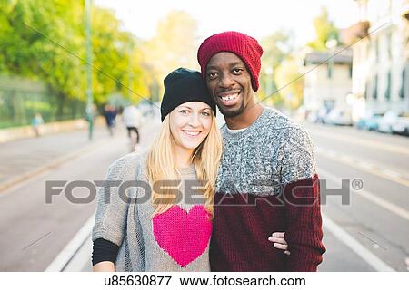 Stock Photo - Couple posing on street. Fotosearch