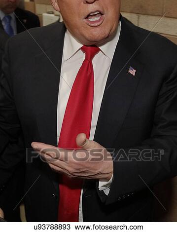 Stock Image - Cropped view of Donald Trump as he campaigns at Nevada Caucus polling station, Palos Verde Highschool, NV. Fotosearch