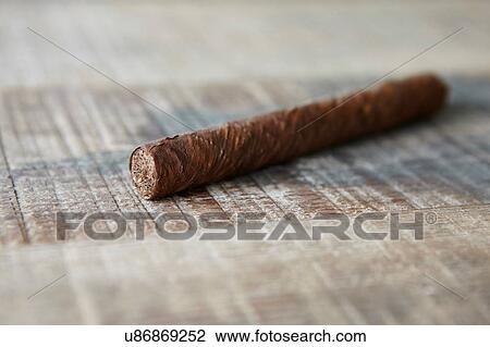 Cuban cigar on table, Cuba View Large Photo Image Stock Image - Cuban cigar on table, Cuba. Fotosearch