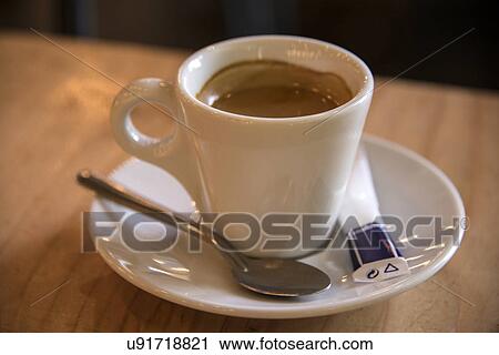 Stock Image - Cup of coffee on a saucer. Fotosearch