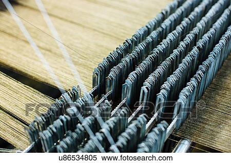 Detail of threads on weaving machine View Large Photo Image Stock Photography - Detail of threads on weaving machine. Fotosearch