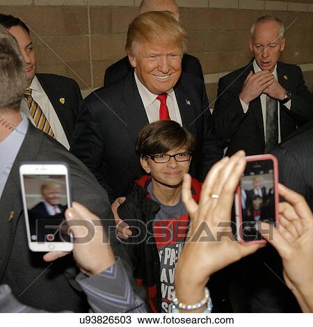 Stock Image - Donald Trump campaigns at Nevada Caucus polling station, Palos Verde Highschool, NV. Fotosearch