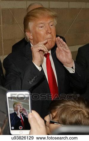 Stock Photo - Donald Trump campaigns at Nevada Caucus polling station, Palos Verde Highschool, NV. Fotosearch