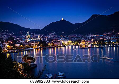 Elevated view of city lights at night on lake Como, Como, Lombardy, Italy View Large Photo Image Stock Image - Elevated view of city lights at night on lake Como, Como, Lombardy, Italy. Fotosearch