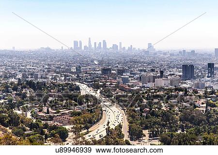 Elevated view of highway curving through urban sprawl, Los Angeles, California, USA View Large Photo Image Stock Photo - Elevated view of highway curving through urban sprawl, Los Angeles, California, USA. Fotosearch