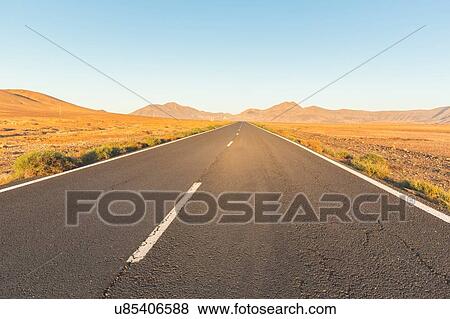 Empty road and landscape, La Oliva, Fuerteventura, Spain View Large Photo Image Stock Photo - Empty road and landscape, La Oliva, Fuerteventura, Spain. Fotosearch