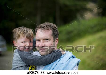 Father holding son View Large Photo Image Stock Image - Father holding son. Fotosearch