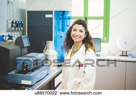 Female scientist and Thermogravimetric/Differential Thermal Analyzer View Large Photo Image Stock Image - Female scientist and Thermogravimetric/Differential Thermal Analyzer. Fotosearch