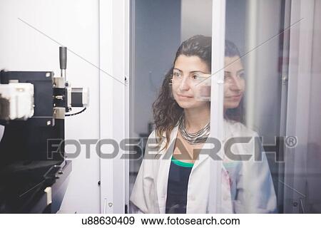 Female scientist monitoring motor alignment on x-ray diffractometer machine View Large Photo Image Stock Photo - Female scientist monitoring motor alignment on x-ray diffractometer machine. Fotosearch
