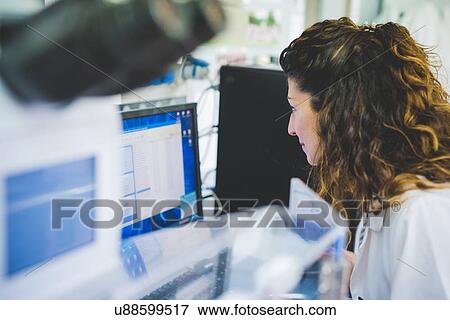 Female scientist using FTIR spectrophotometer, analyzing FTIR map View Large Photo Image Stock Photo - Female scientist using FTIR spectrophotometer, analyzing FTIR map. Fotosearch